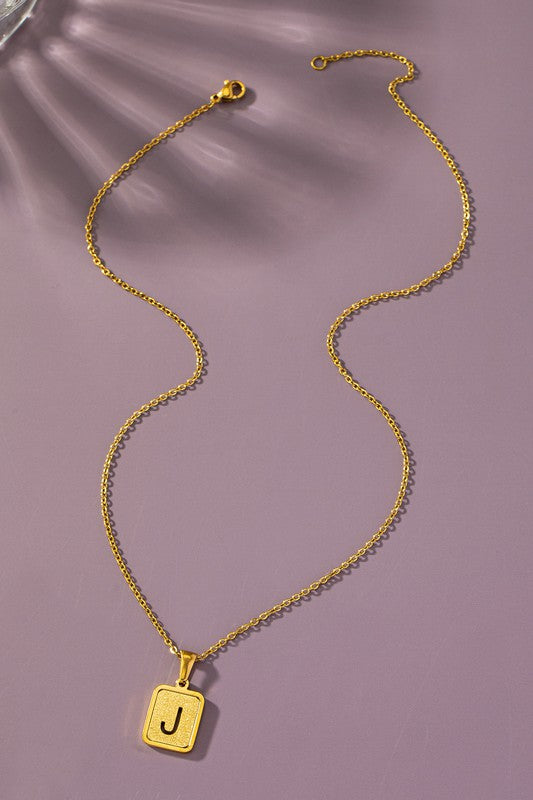 Brass diamond dust cut out initial necklace